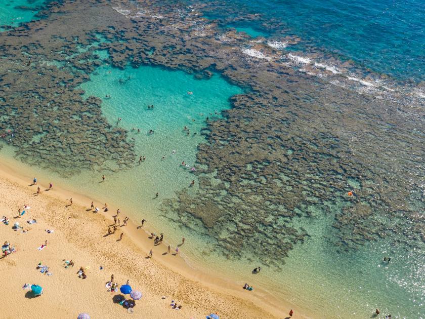 Aerial view of the clear water of Hanauma Bay nature preserve near Waikiki on Oahu, Hawaii