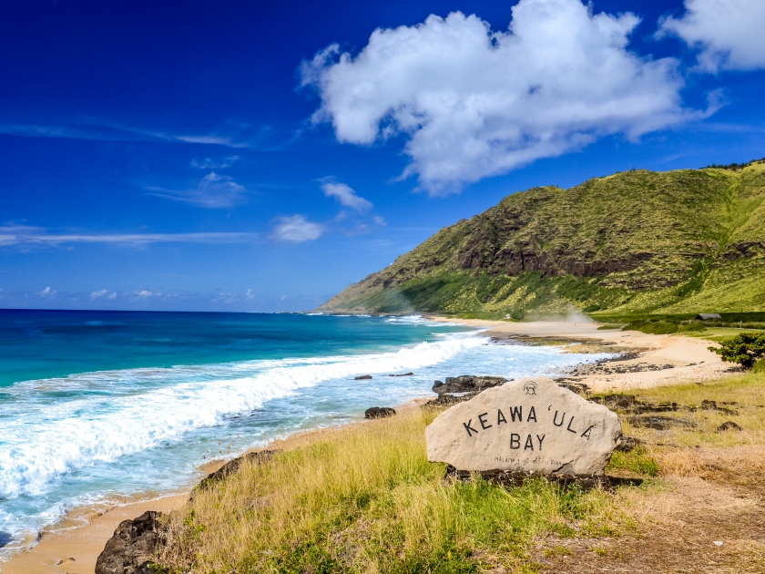 Beautiful Keawa'Ula Bay and Keawaula Beach on the Hawaiian island of Oahu near the westernmost point of Oahu, Ka'ena Point. Sunny day, dangerous waves and a 