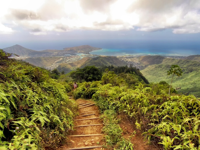 Female hiker making her way to summit of Kuliouou Ridge Trail outside Honolulu, Hawaii