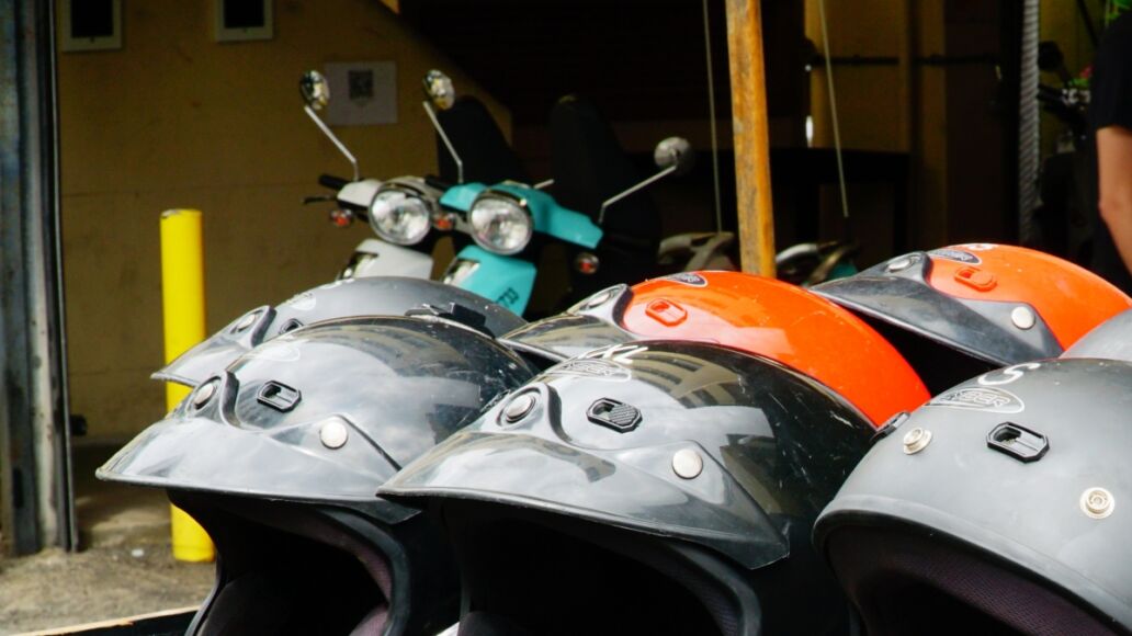 Honolulu Hawaii USA. ‎October ‎11, ‎2019. Helmets waiting to protect peoples heads if they rent a scooter.