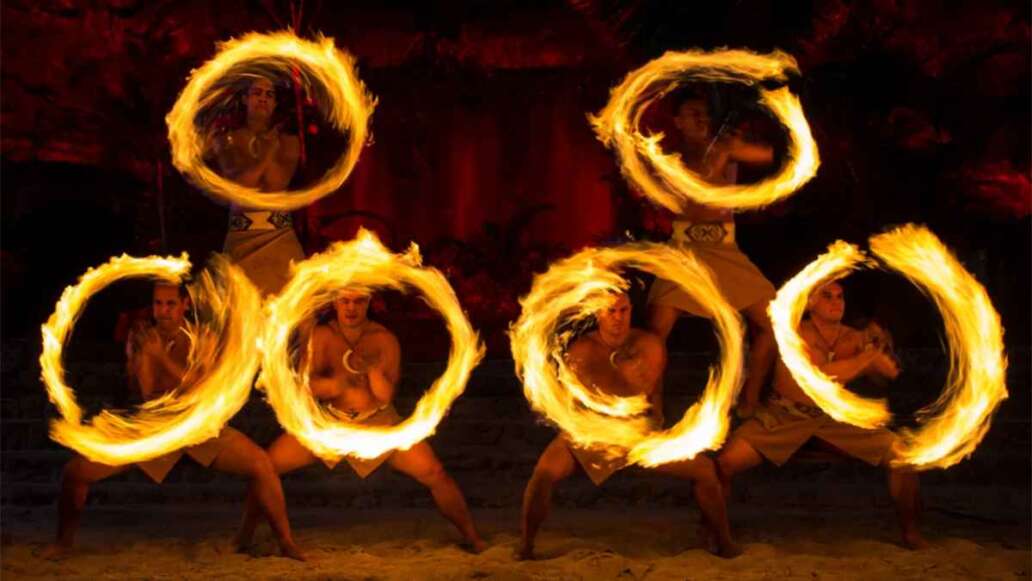 See a night show with fire knife dancing